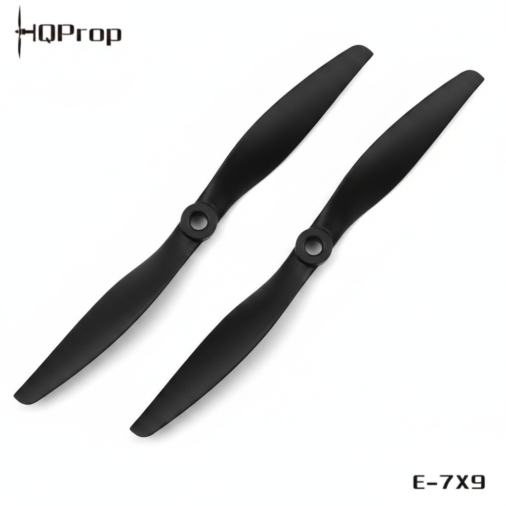 A black quadcopter replacement propeller, model E-7X9, shown diagonally on a plain white background with the HQProp brand logo in the top-left corner and the model number in the bottom-right.