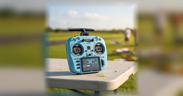 Jumper T15 ELRS radio controller at an outdoor model flying field
