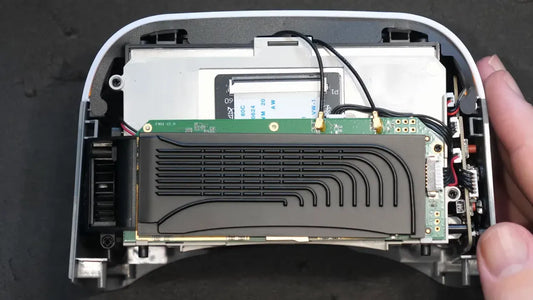 Caddx Protos Ascent goggles with the lid removed revealing internal layout