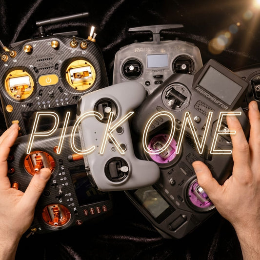 A collection of various Radiomaster radio controllers on a desk.