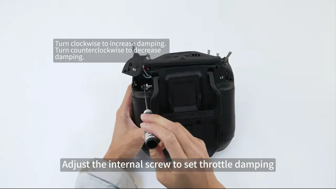 Back of the TX16S MK3 with shoulder module removed and internal damping adjustment note visible