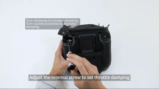 Back of the TX16S MK3 with shoulder module removed and internal damping adjustment note visible