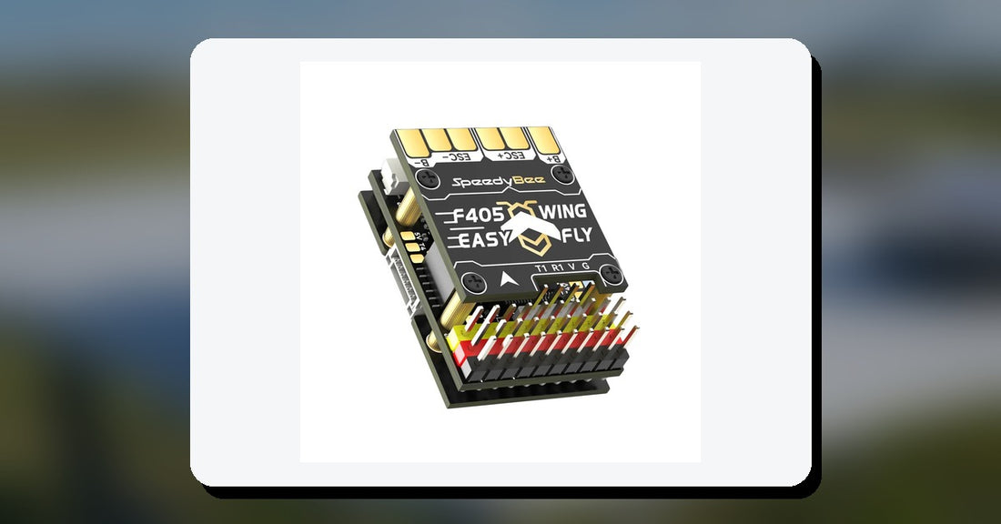 SpeedyBee F405 WING MINI fixed-wing flight controller on a workbench