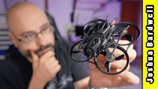 Pavo Pico II micro FPV drone held in front of the reviewer
