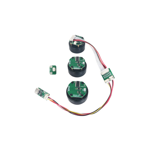Electronic components including capacitors and connectors on a white background