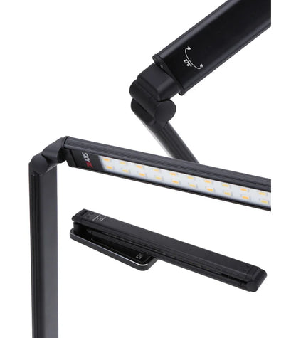 Black adjustable desk lamp with LED light on a white background