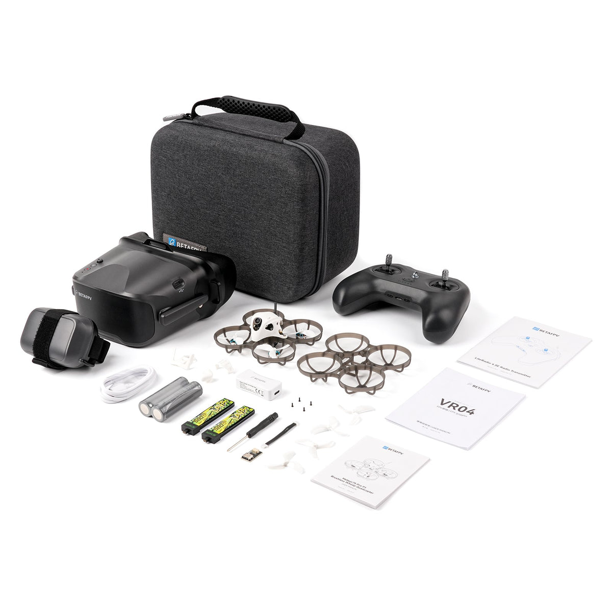 Drone kit with case, remote control, and accessories on a white background