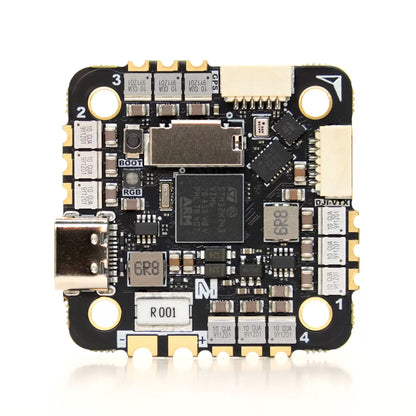 Electronic circuit board with various components on a white background