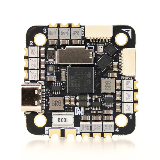 Electronic circuit board with various components on a white background