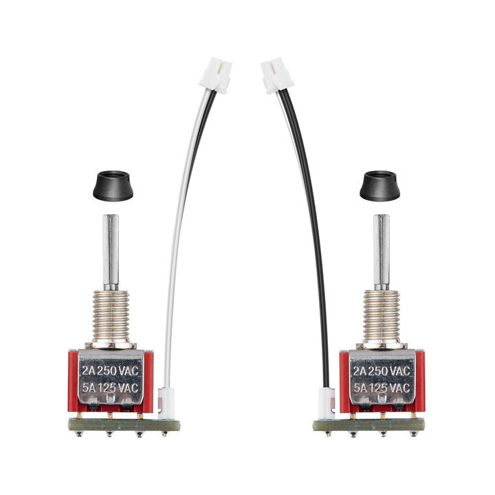 Two mechanical switches with leads on a white background