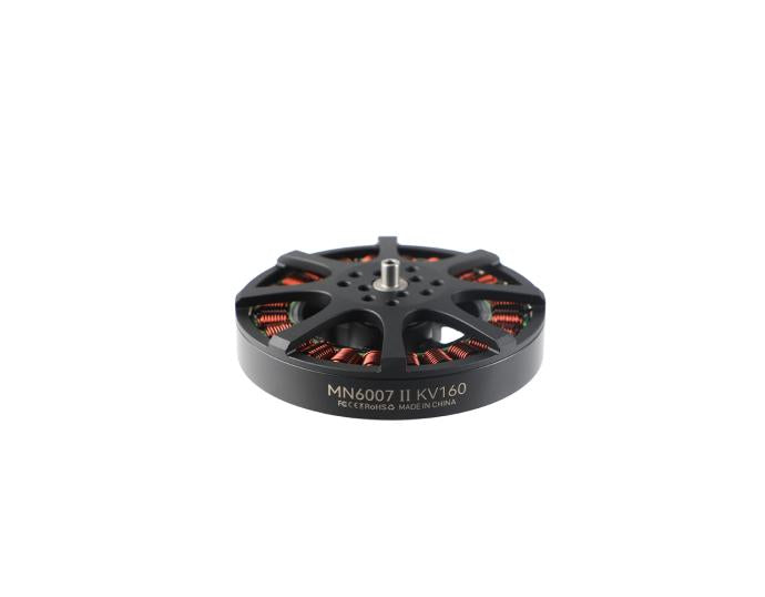 A black brushed motor rotor with copper windings and white printed text reading 'MN6007 II KV160' on a clean white background.
