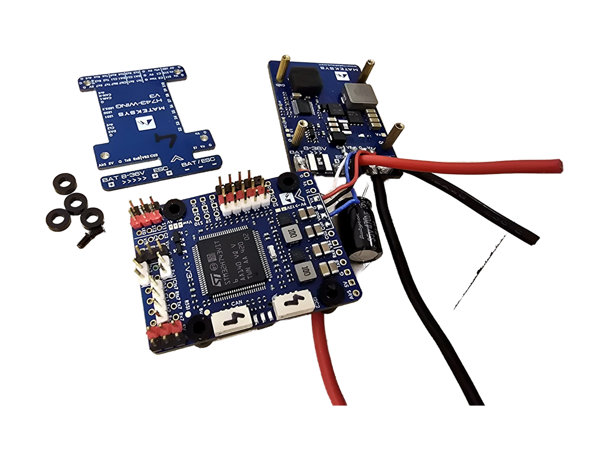 Detailed view of the exact soldered Matek H743-WING V3 bargain-bin unit on a transparent background